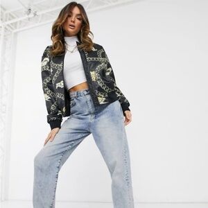 Nike Women’s satin black with gold chain bomber jacket size XS